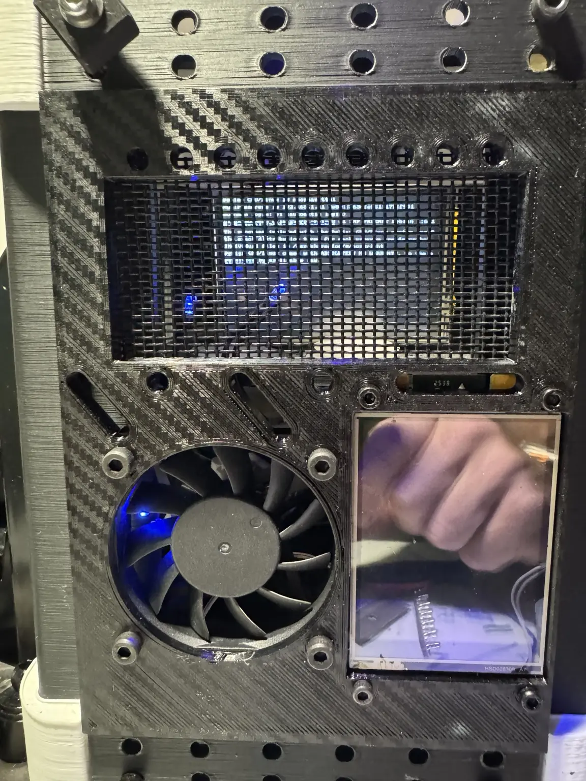 MMRS rear panel showing cooling fan, electronics bay, and display