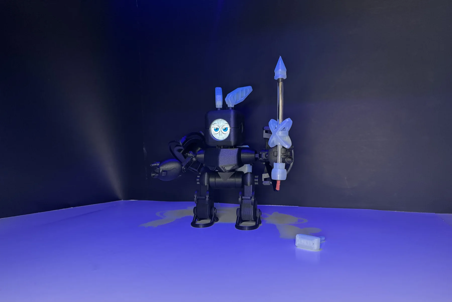Moki MK2 robot prototype with animated round display and atomic light blade