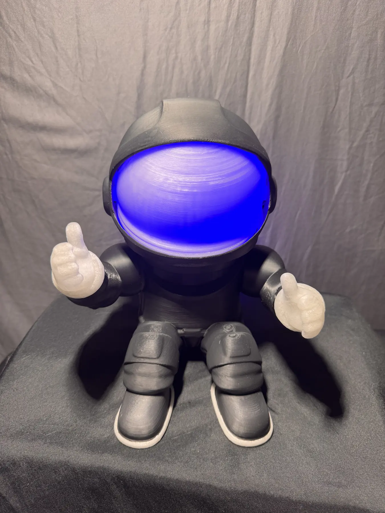 Completed Moon Man prototype with illuminated helmet and modular accessory system