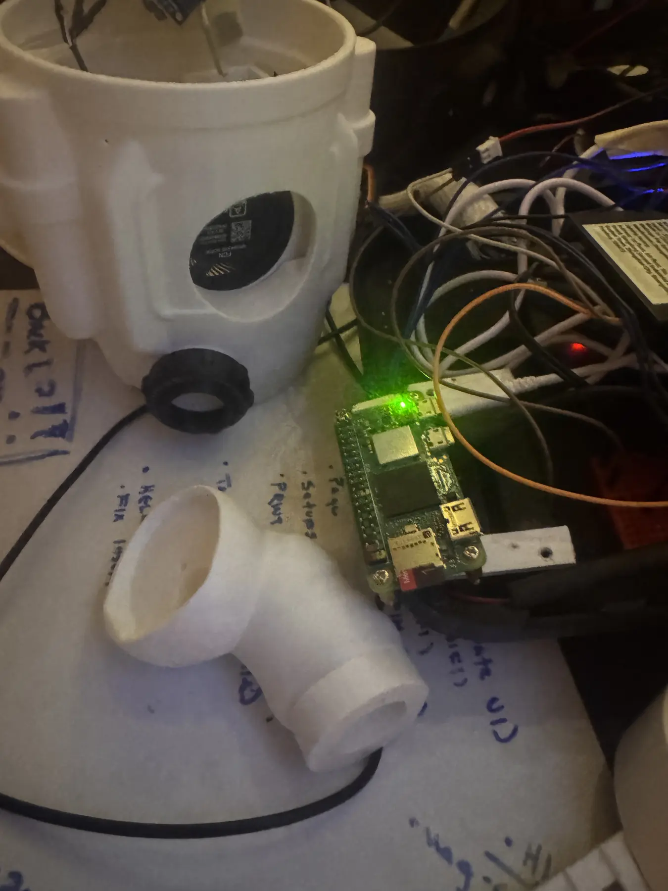 Raspberry Pi and printed Moon Man components during electronics development
