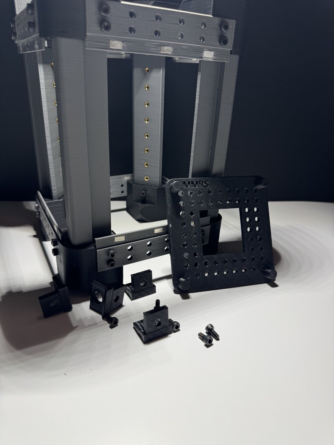 Bare MMRS modular test rig with removable panels and components arranged for assembly